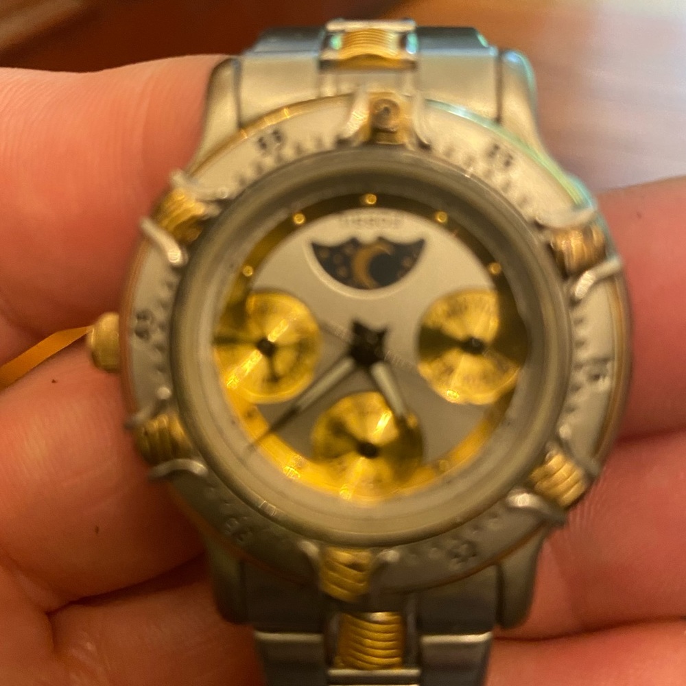 Fossil gold and silver tone moonphase watch